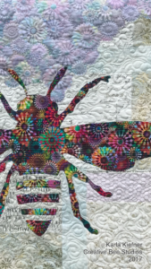 Image of Quilt with Bee.