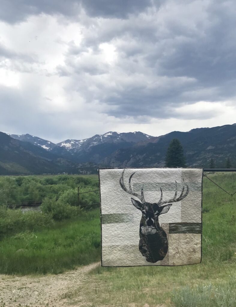 deer quilt in mountains