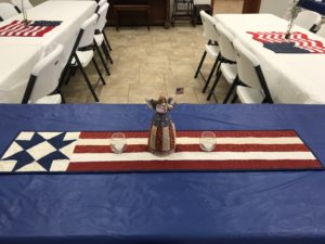 Image of Three Quilts on Tables