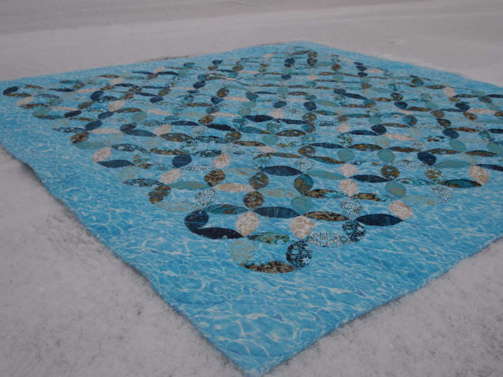 Image of Water Colours Quilt in the snow.