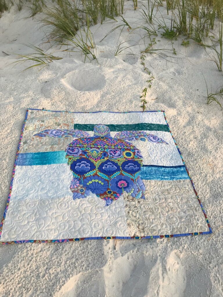 Image of Sandy Quilt on Sand.