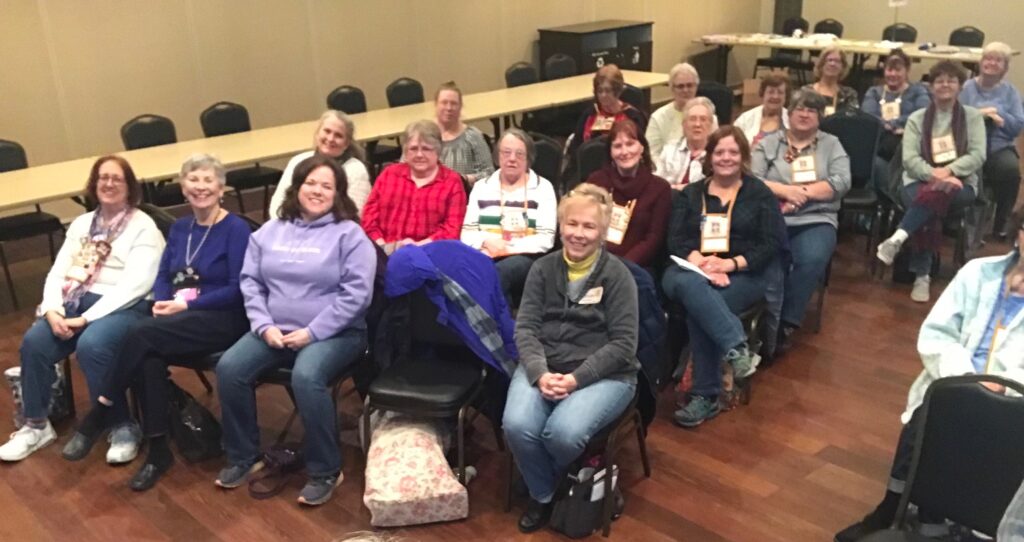 Image of Quilters at Loose Threads quilt  program