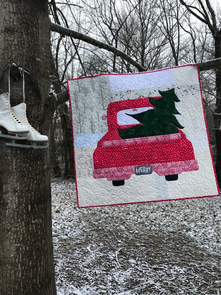 Image of Red Truck Christmas Quilt in Snow