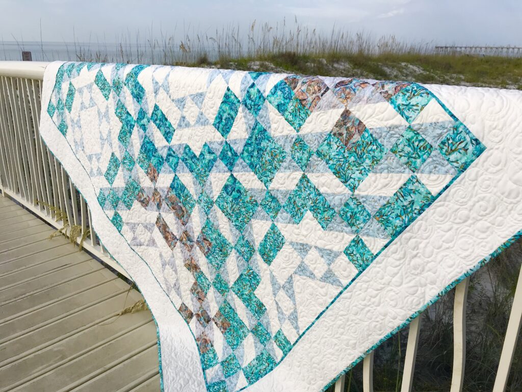 Image of one block quilt pattern at beach