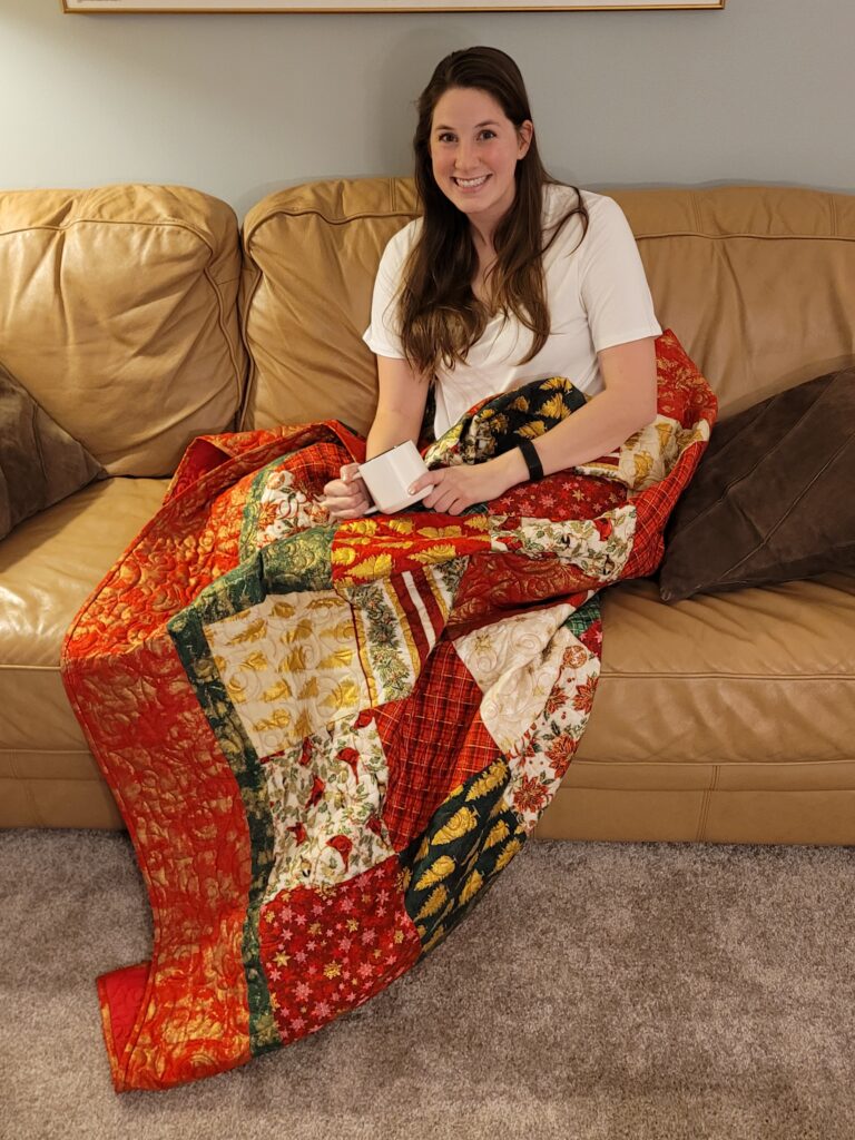 Julia with Christmas quilt