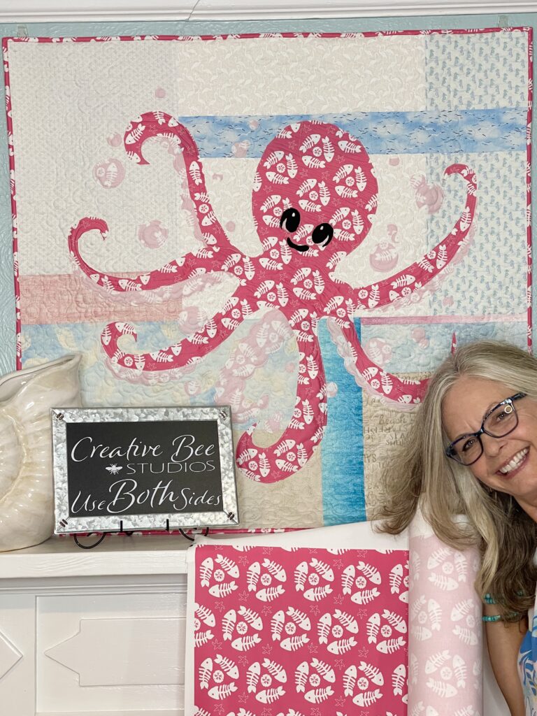 Use both sides of Pinky the baby octopus nautical nursery fabric